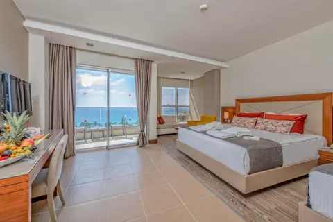 Junior Suite Deniz Manzaralı Oda — oda görseli
